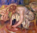 Frau binden ihre Schnürsenkel Pierre Auguste Renoir